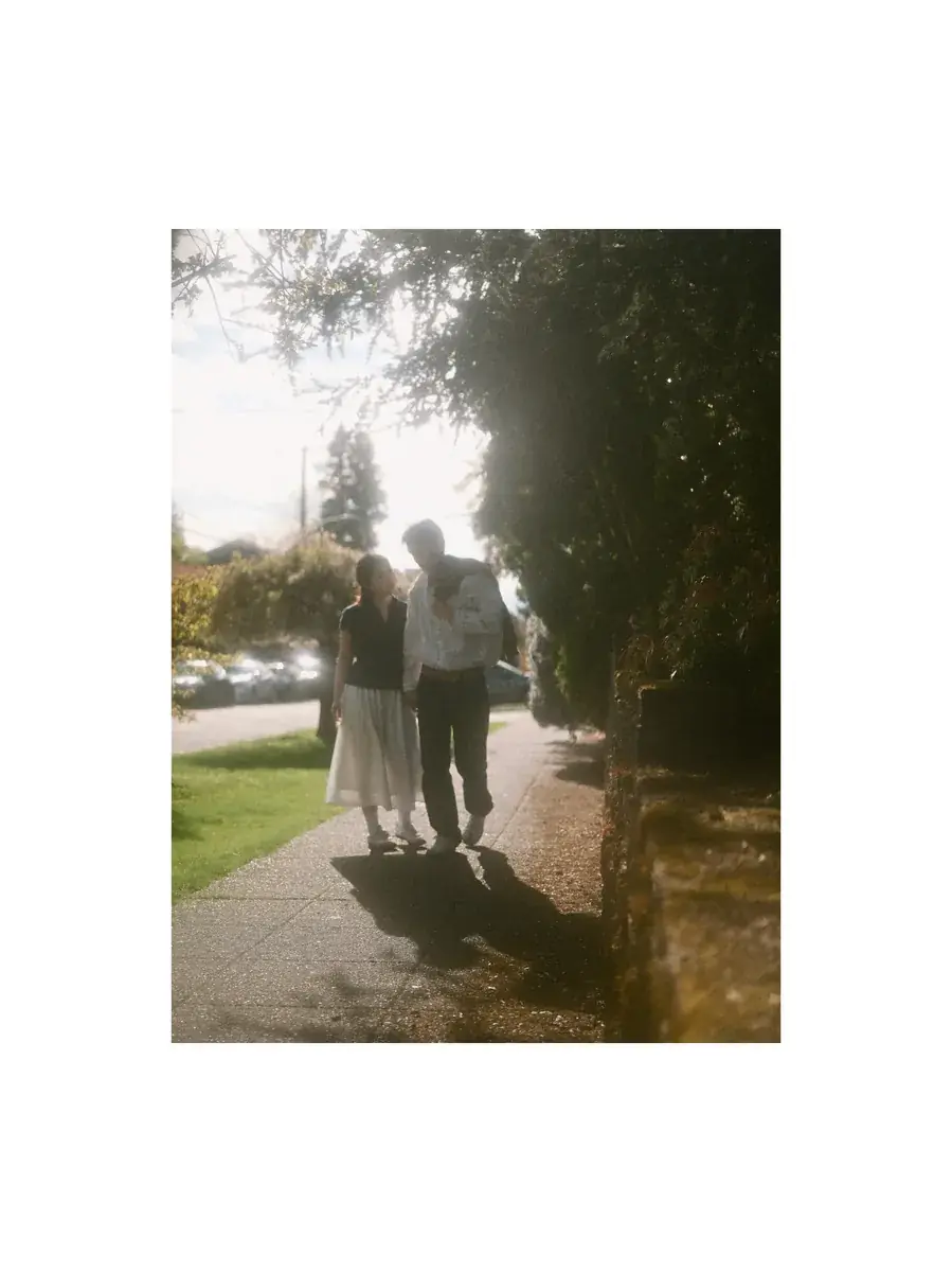 Couple walking together in warm late-afternoon light