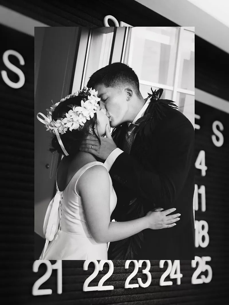 A newly married couple celebrating just after their Seattle courthouse ceremony