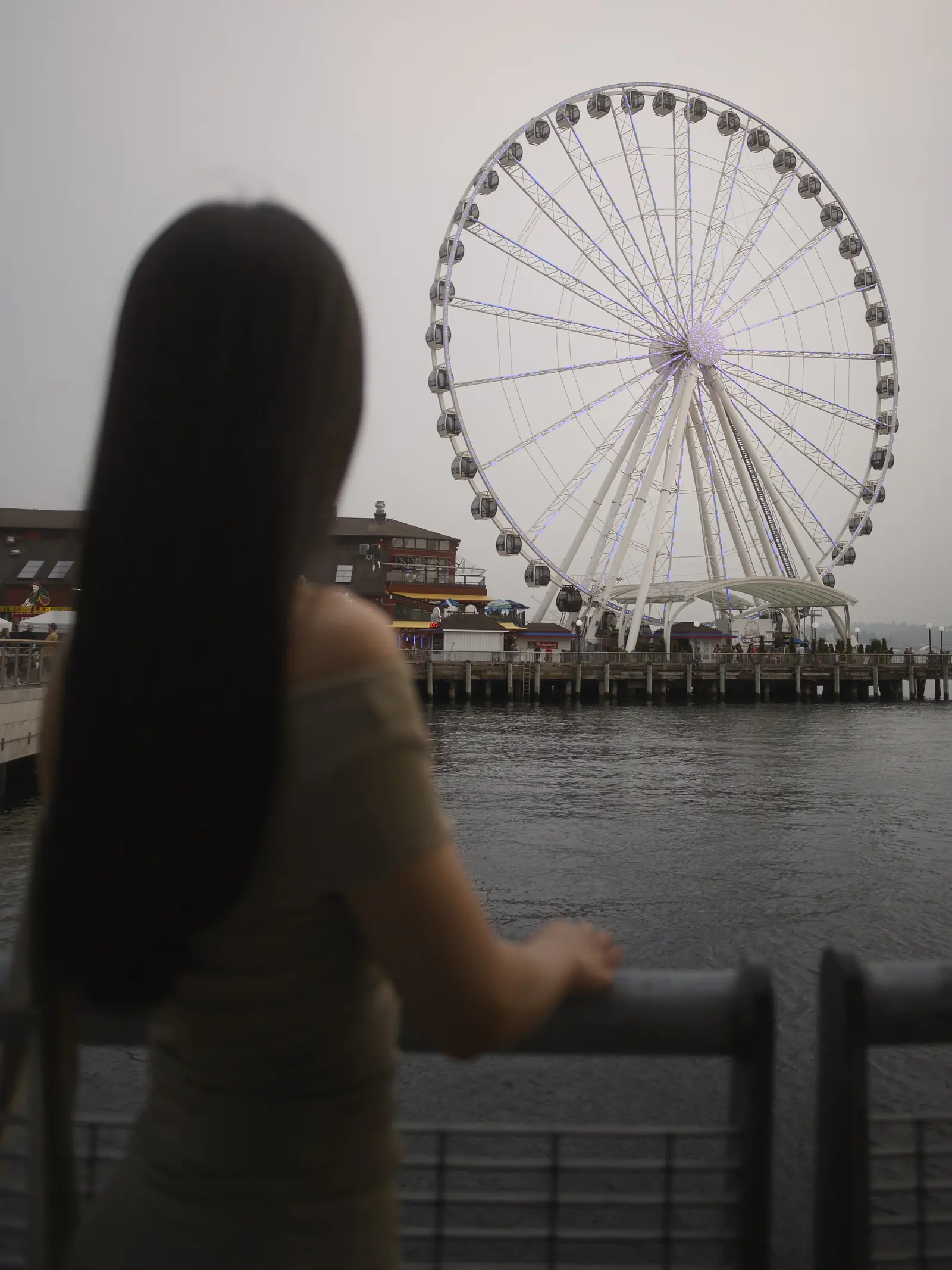 Romantic natural light couples portrait at the Seattle Waterfront Great Wheel